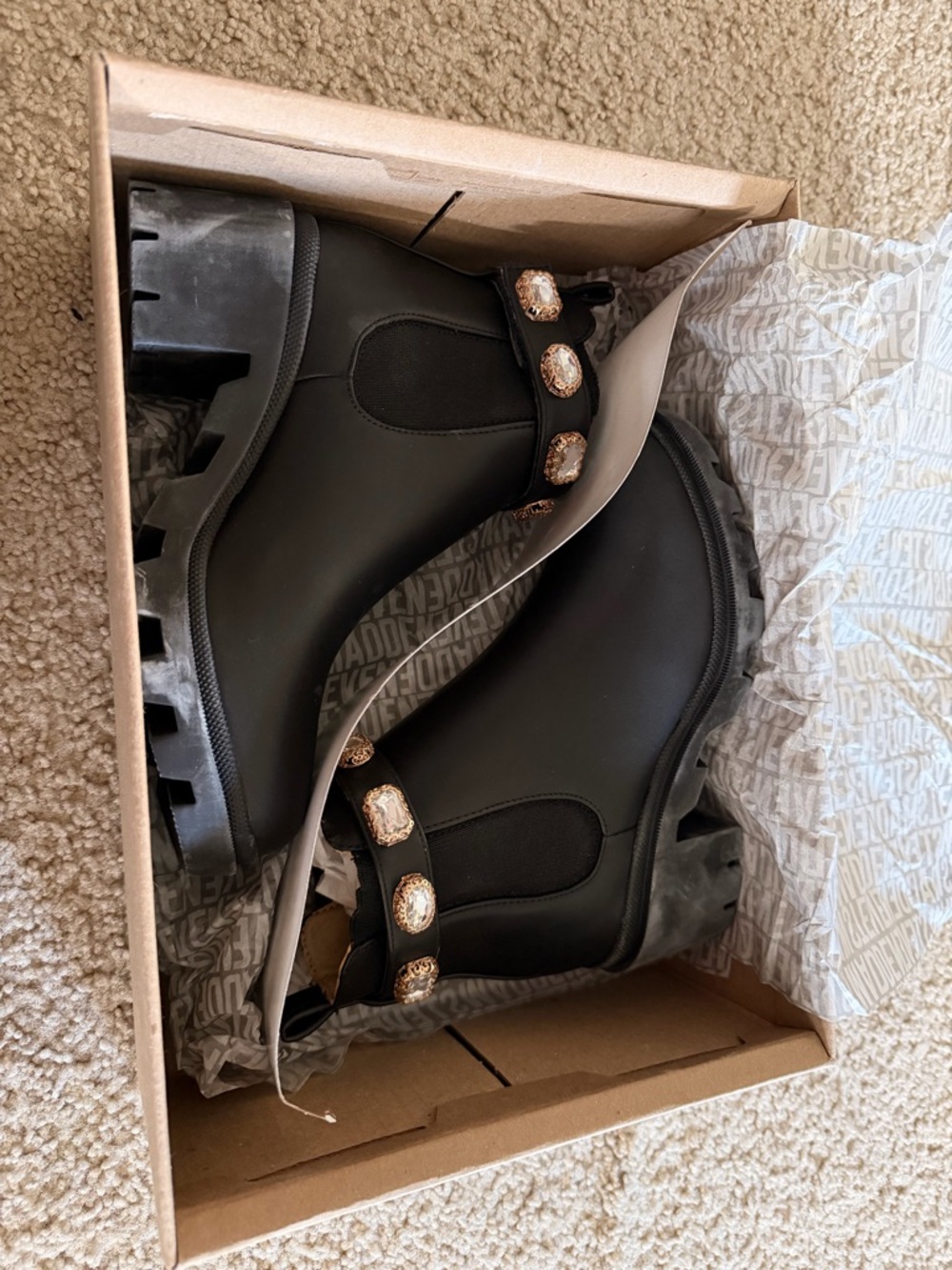 Steve Madden’s Women's Black Chunky Amulet Booties with Gemstone Strap